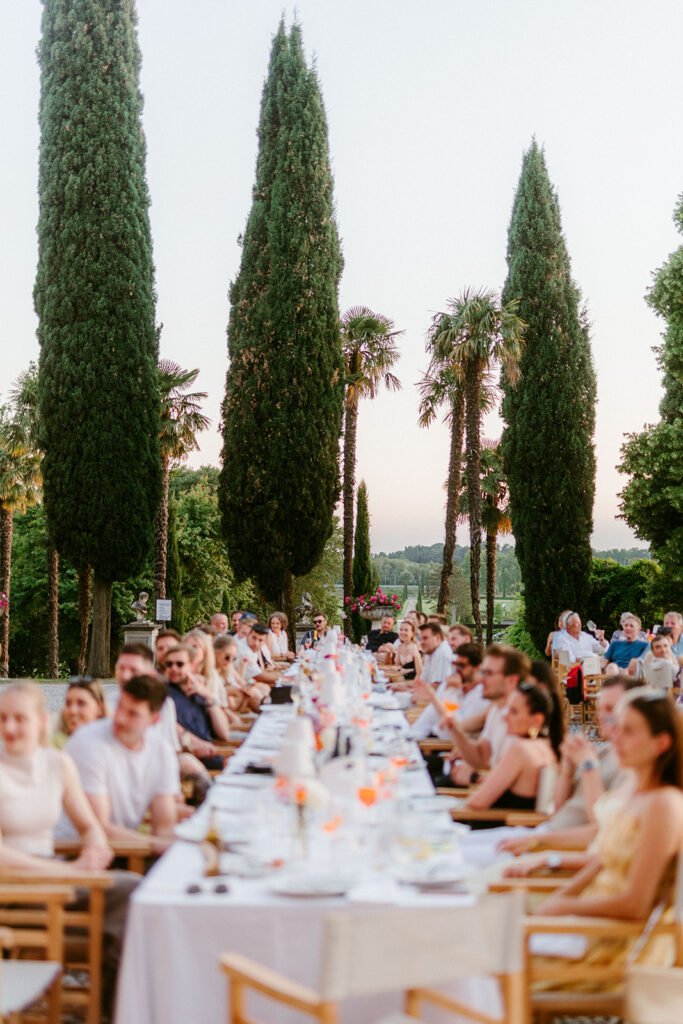 Wedding reception tables in front of Castello di Spessa
