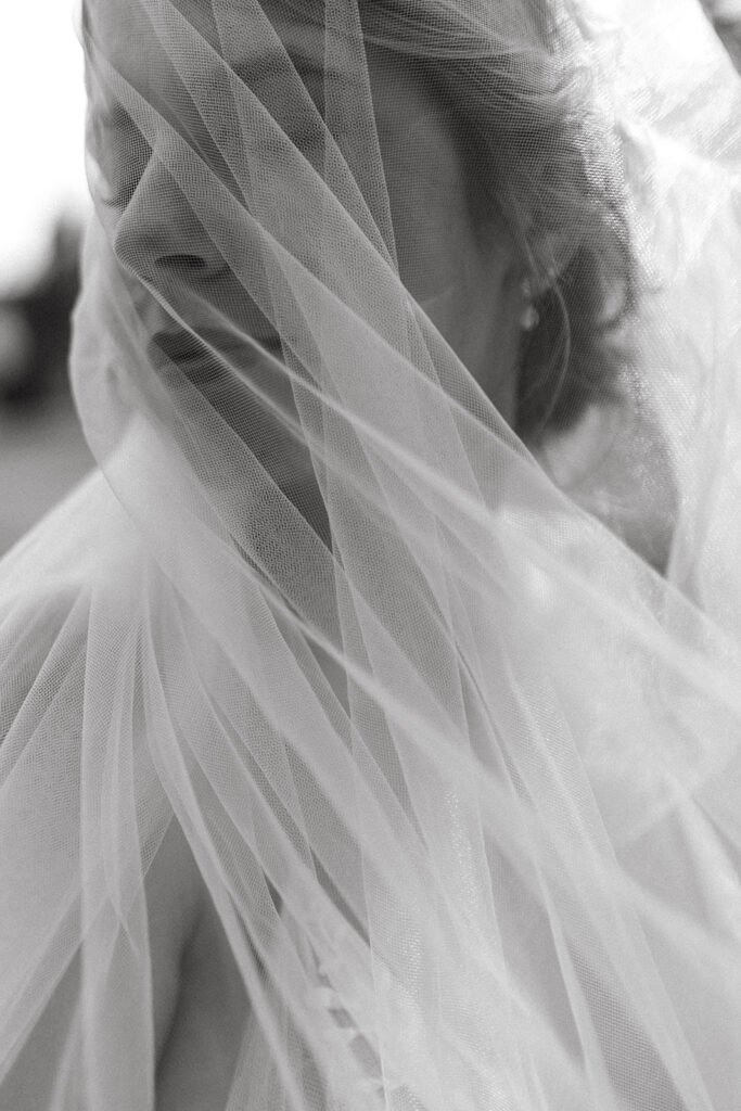 Artistic bridal veil portrait during destination wedding in Italy